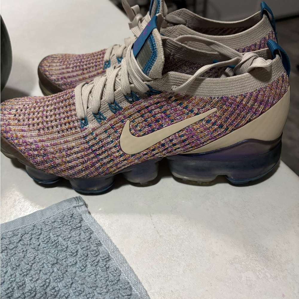 Nike Flyknit Sneakers with Cream and Blue Accents